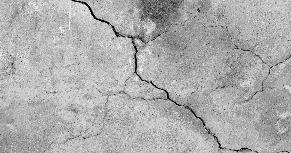 Close up of cracks in pavement.