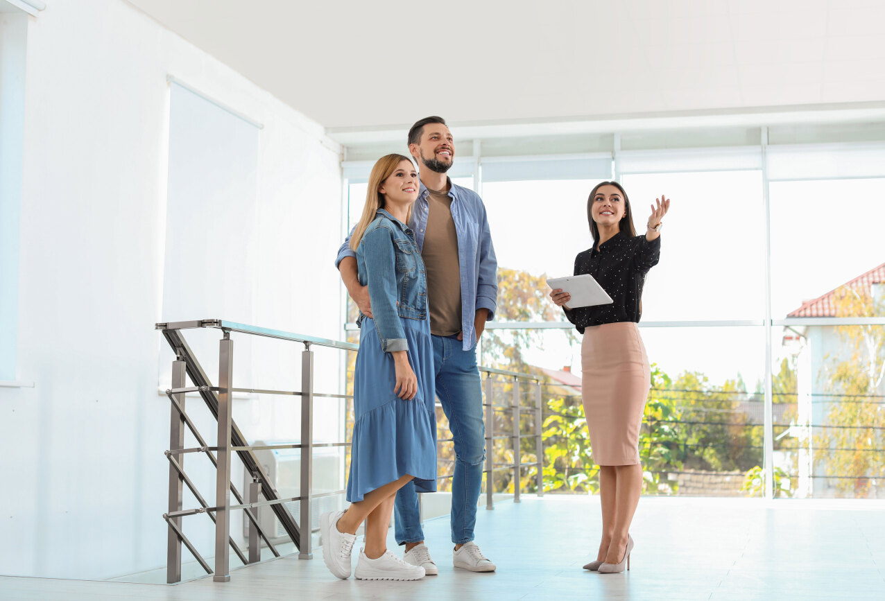 people looking at a house to buy