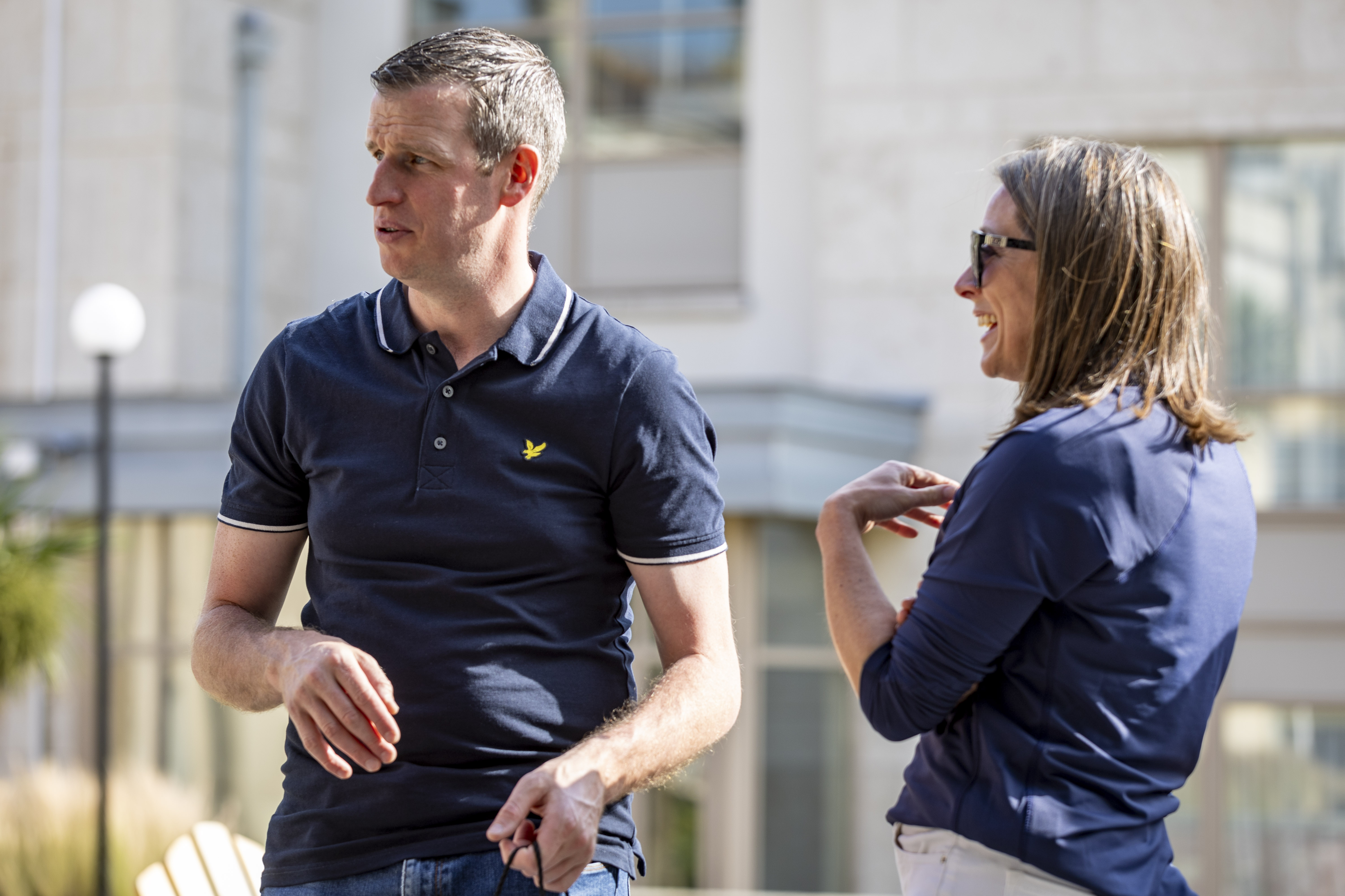 Two corporate decision-makers having a friendly conversation