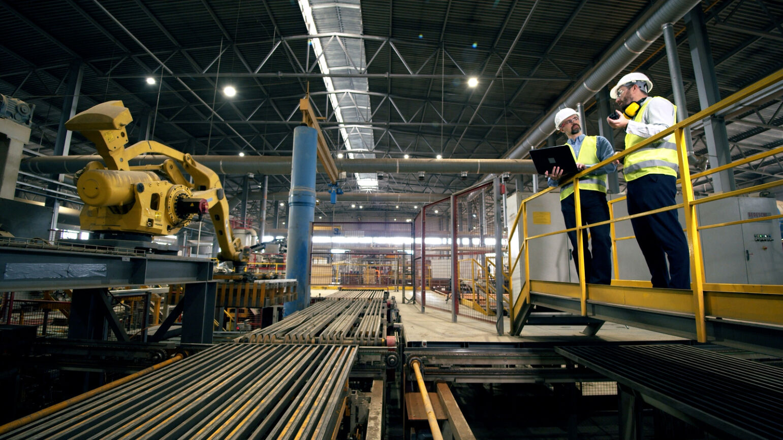 workers having a discussion in a factory
