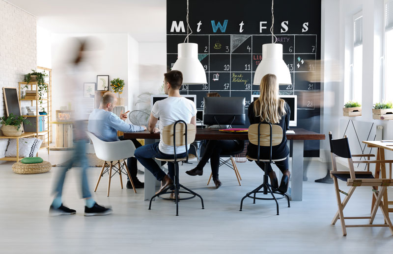 Coworkers busy working in a modern office.